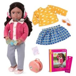 OUR GENERATION DELUXE TRAVEL DOLL W/ BOOK, AT